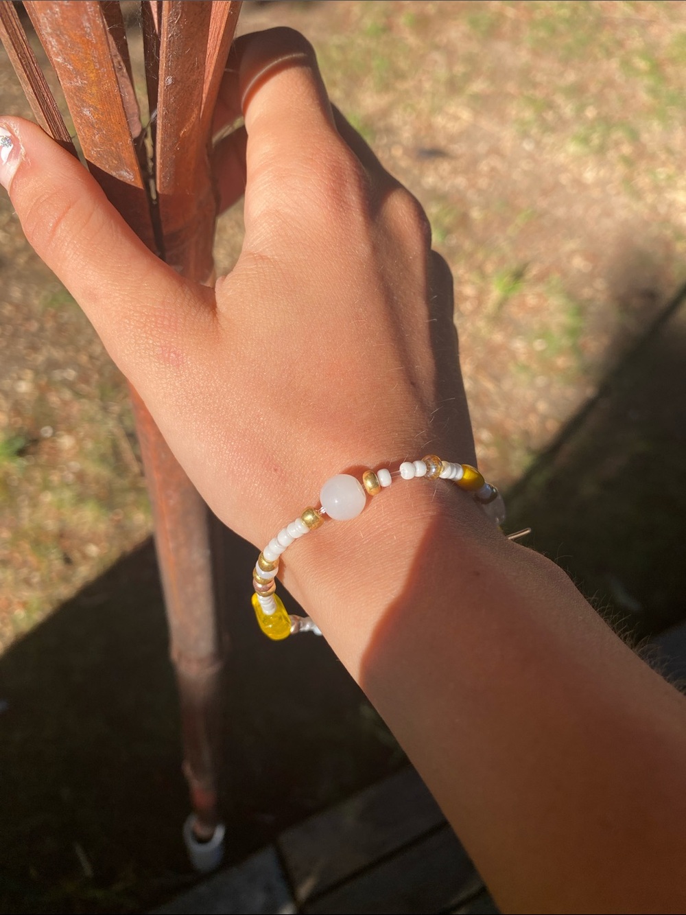 Homemade White & Yellow Beaded Bracelet with Gold Accents